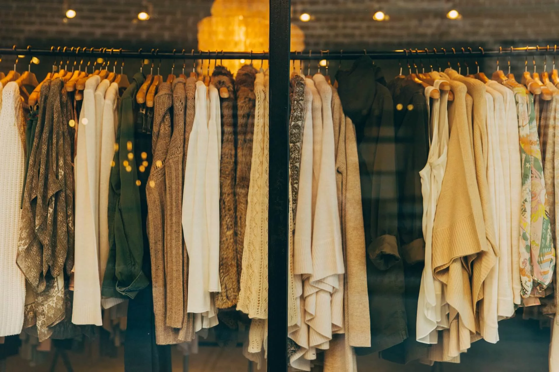 women's clothes hanging in a store